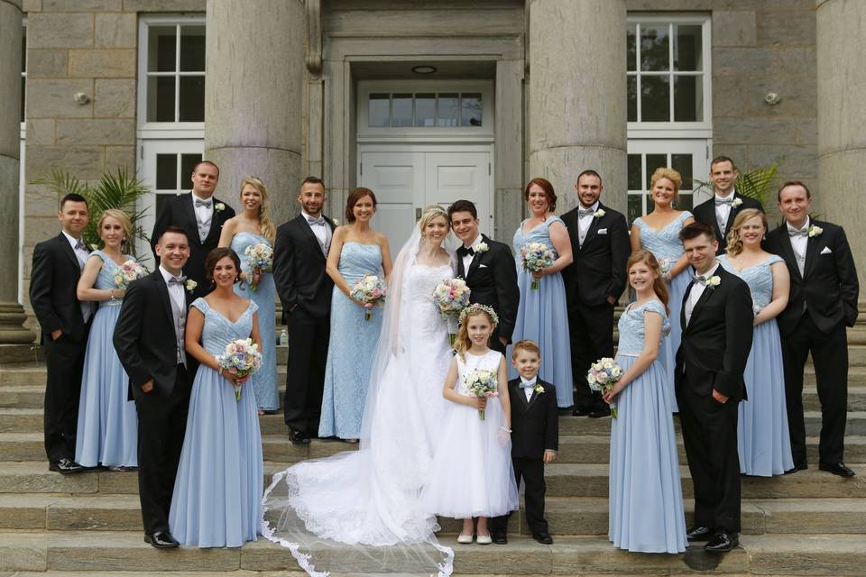 The newlyweds with the wedding attendants