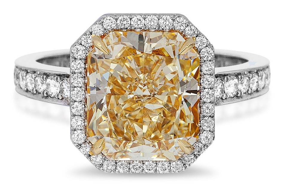 11284	<br>	Fancy Yellow Radiant Cut Diamond Ring with Tapered Bullet Diamonds - in Platinum (5.77 CTW)