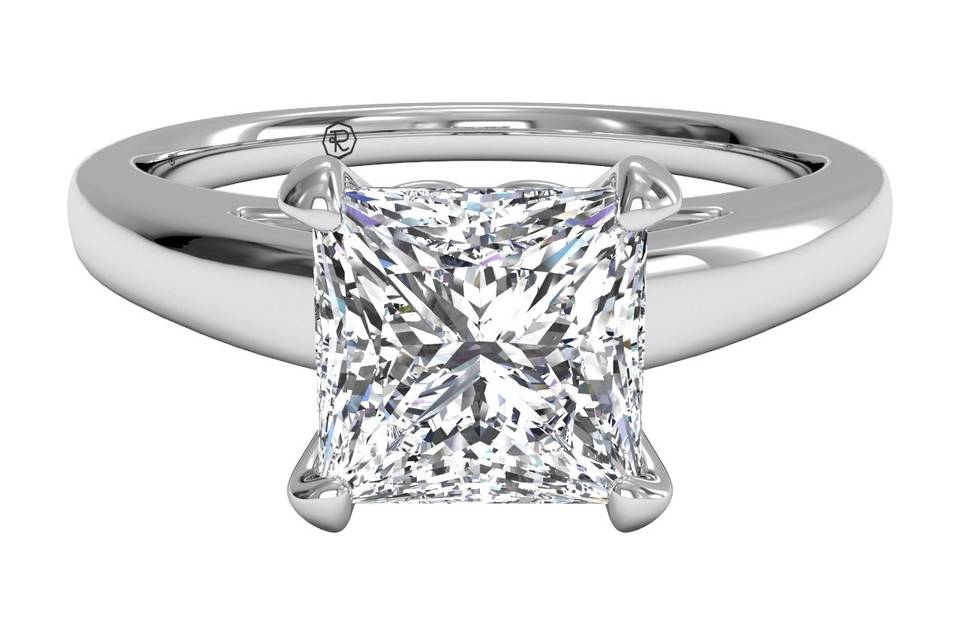 5661	<br>	Solitaire Diamond Tapered Engagement Ring with Surprise Diamonds - in Platinum - (0.04 CTW)