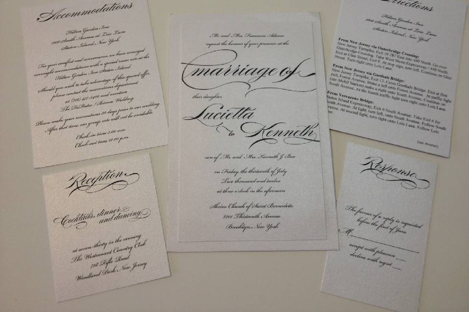 Classic black and white invitations with a dramatic eye catching font.