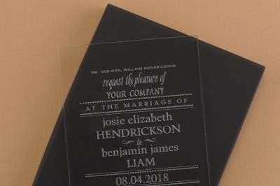Acrylic invitation with playful fonts.