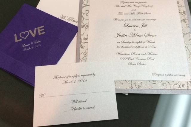 Matching bordered invitation and place card with a personalized napkin.
