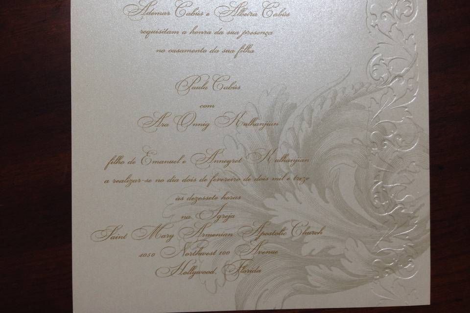 An elegant invitation with an embossed design.