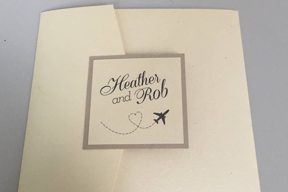 Front of a pocket invitation with a plane graphic.