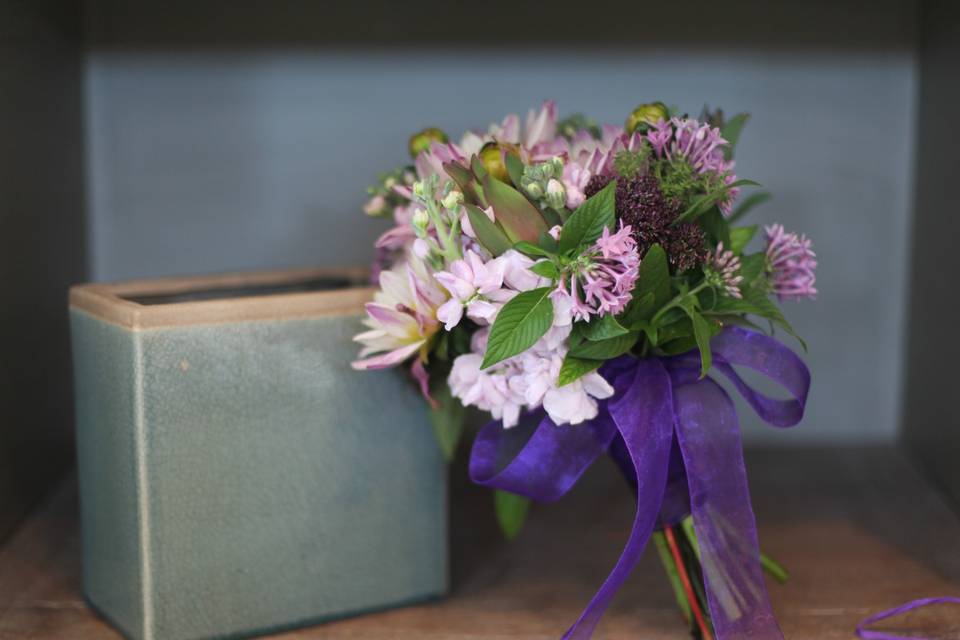 Purple ribbon on bouquet