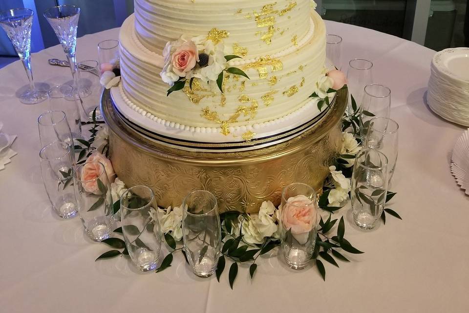 Textured cake with floral toppers