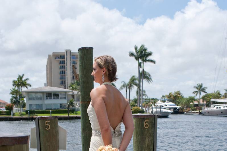 Bride looking over the dock