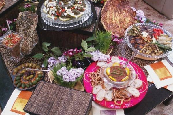 notice how our displays utilize interesting platters, lots of natural botanicals and wheatgrass.  We love to delight you and your guests with fabulous looking and delicious food offerings.