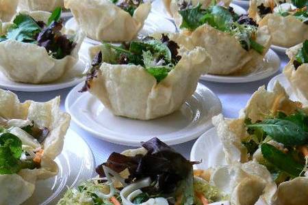 east meets west salad served in crispy wonton bowls.