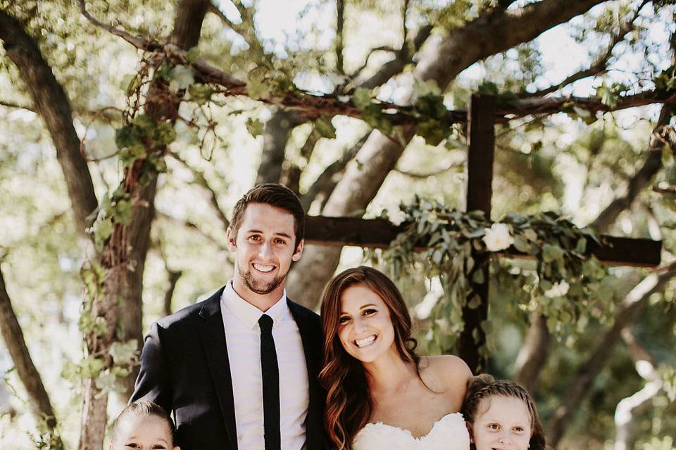 The couple with the flower girls