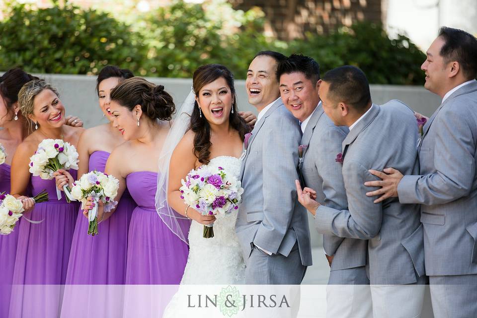 The couple with the bridesmaids and groomsmen