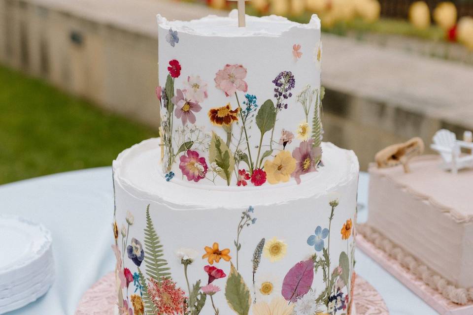 Pressed flower two tier wedding cake