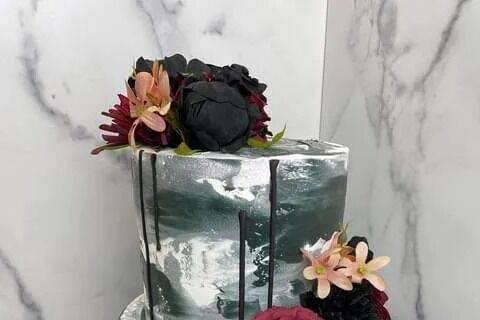 Charcoal drip cake with dark florals