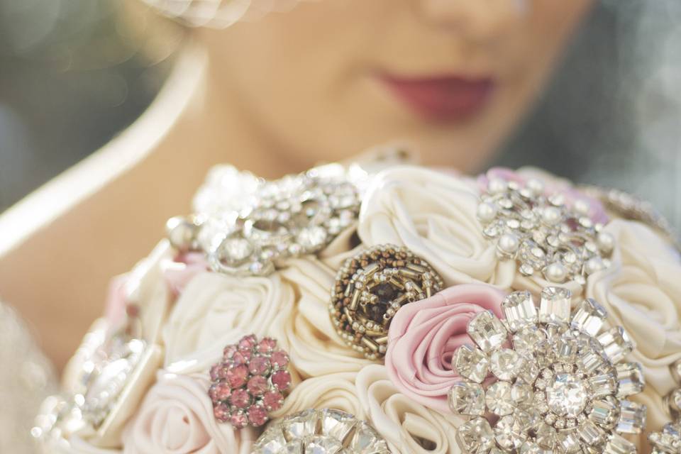Champagne Ivory and pink brooch bridal bouquet with vintage brooches.
Photography by Maegan Hay of maeganhayimaging.com
Bouquet by Elegance On The Avenue