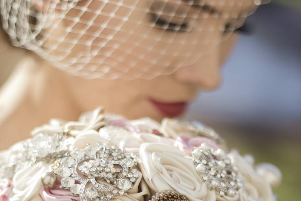 Champagne Ivory and pink brooch bridal bouquet with vintage brooches.
Photography by Maegan Hay of maeganhayimaging.com
Bouquet by Elegance On The Avenue