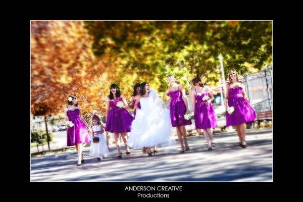Bridal party - Whitney with her fuchsia bouquet and her bridemaids with all white bouquets - a fun twist on the traditional bride carrying white!