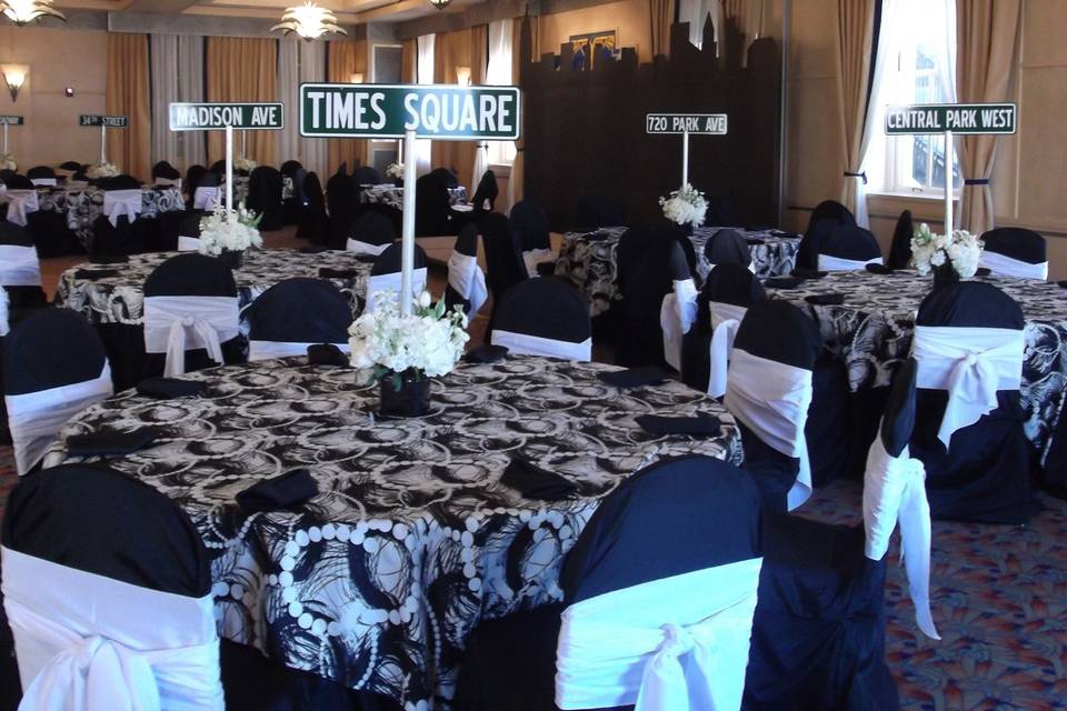 View of the room with street signs placed in centerpieces