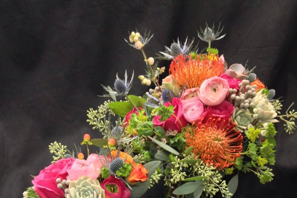 Bridal and bridesmaid bouquets. Lots of texture with succulents, erygium, bupleurum, pin cushion protea and dahlias