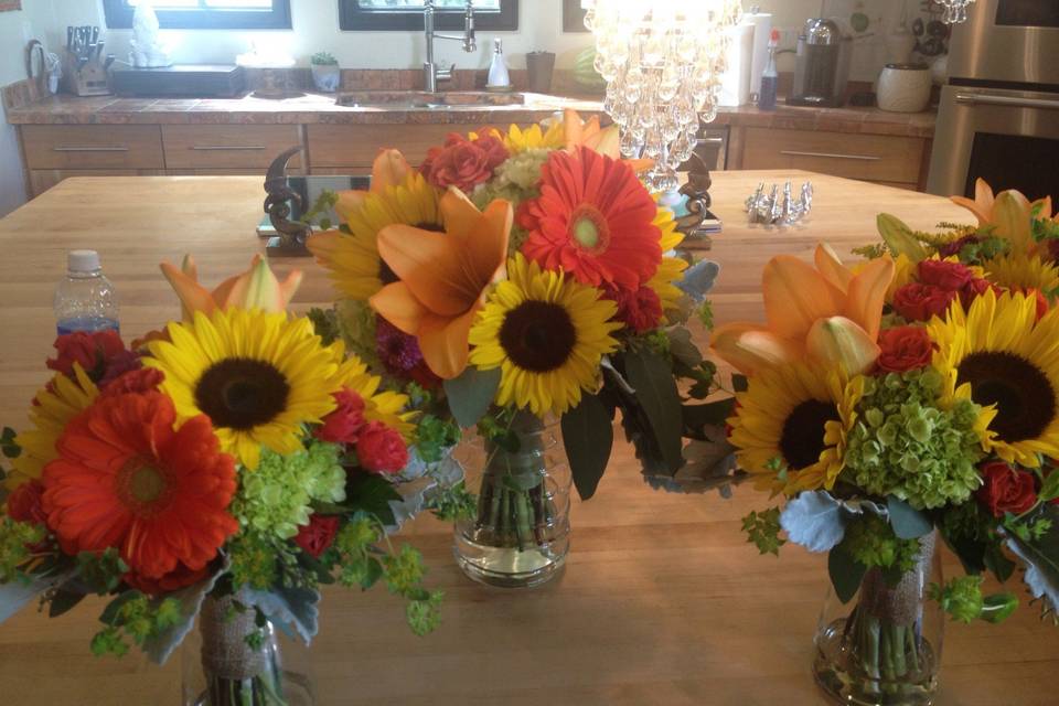 Sunny sunflowers and bright gerbera daisies