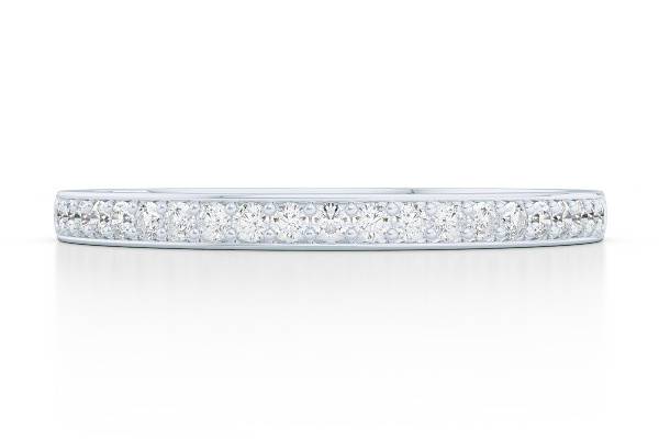 Classic Diamond BandBright White Gold or PlatinumWedding band with clean, elegant silhouette. Delicate, diamond encrusted band, adorned with 0.15ct. F,G/VS1 Round Brilliant Cut Diamonds, that was designed to compliment and match beautifully the Mademoiselle engagement ring from our Paris Collection.