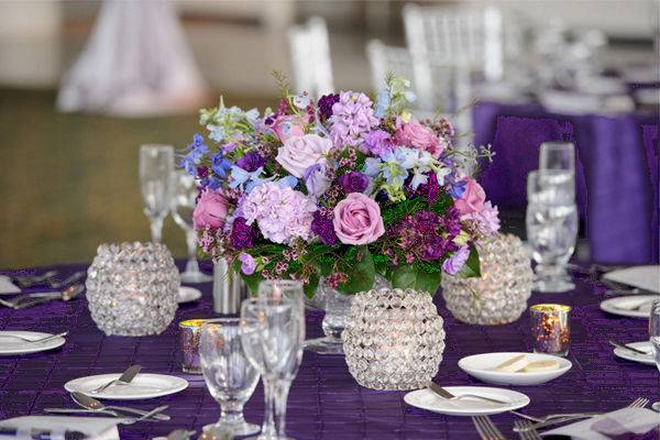 Lavender and purple centerpiece with votives