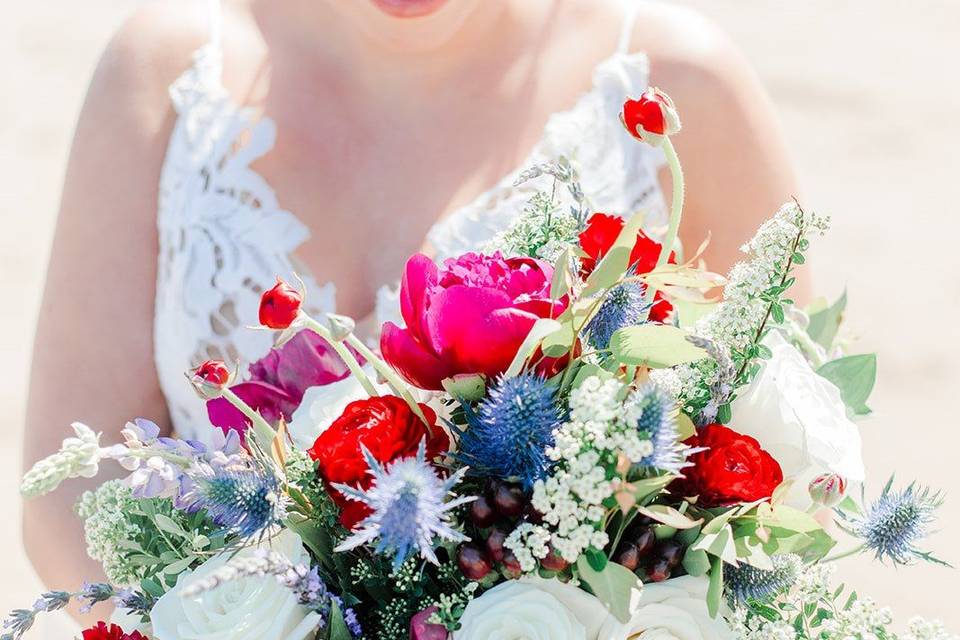 Bride holding a colorful bouquet