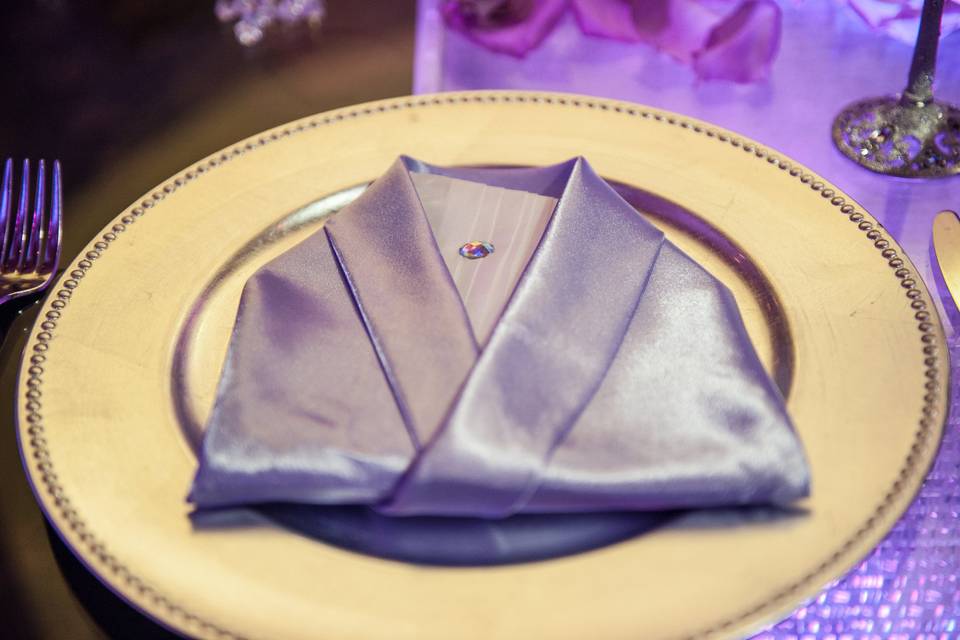 Table napkin folded like a robe