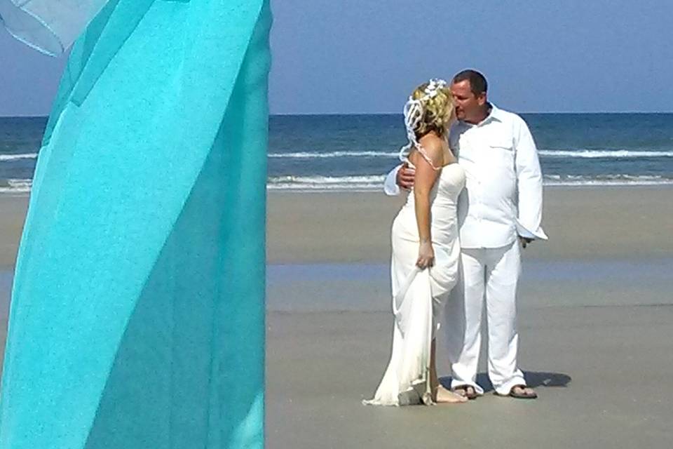 Kissing at the beach