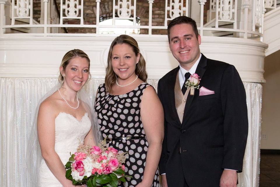 Officiant and the newlyweds