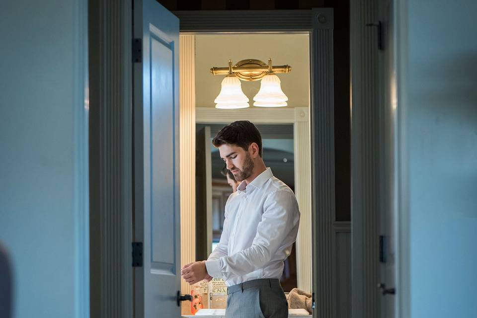 Groom getting ready.