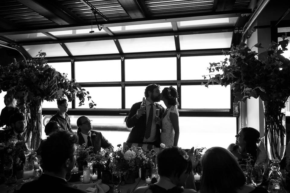 Kissing after a toast.