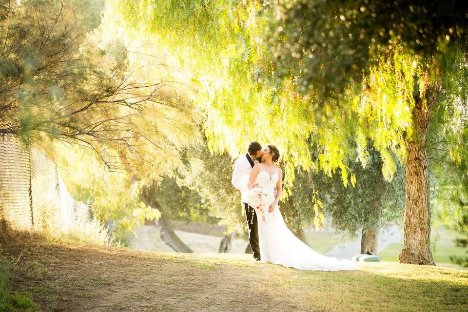 Newlyweds kissing