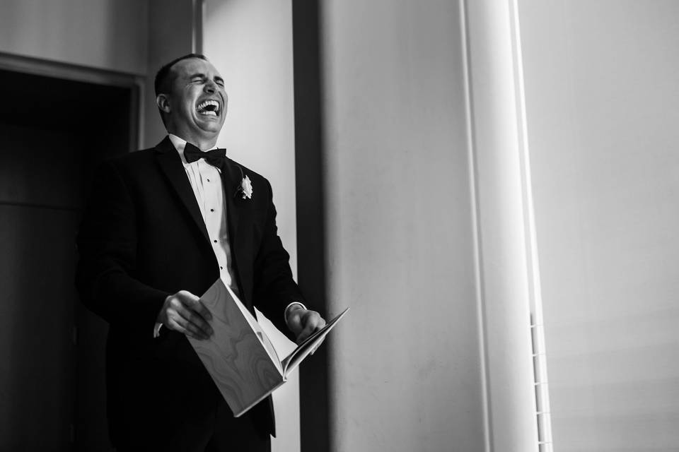 Groom laughing