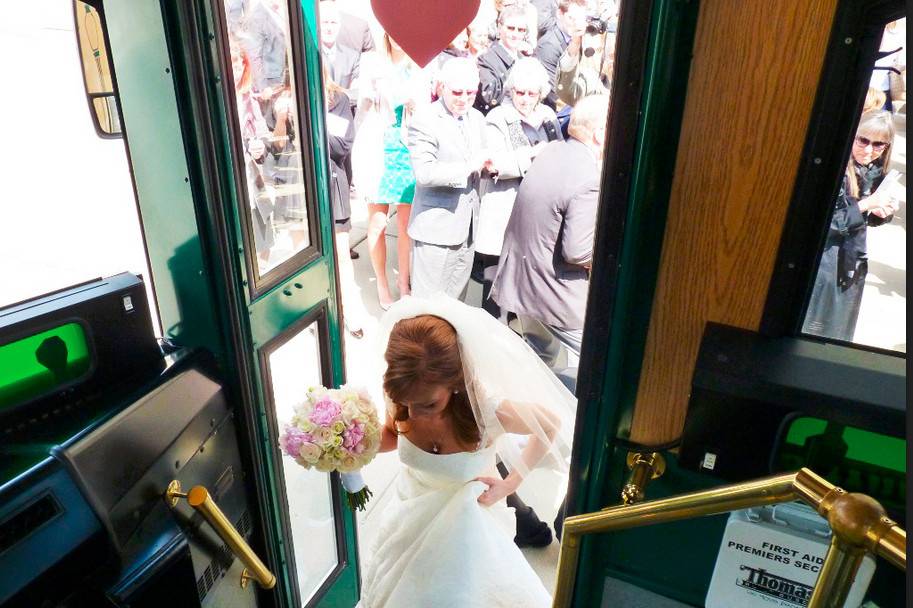 Bride getting on the trolley