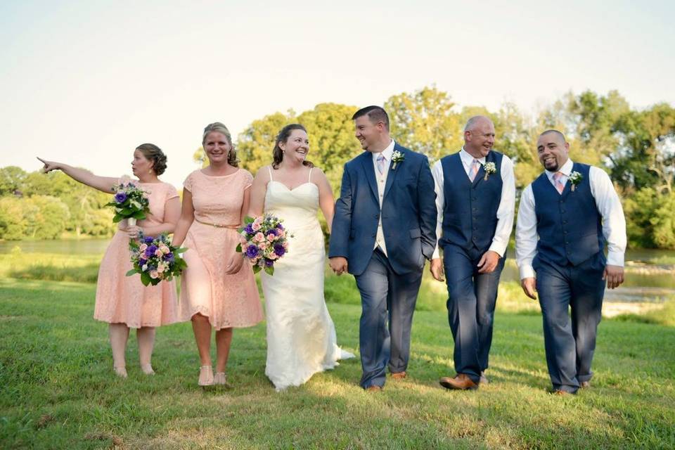 The couple with the bridesmaids and groomsmen