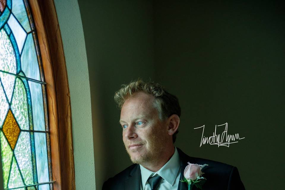 A groom's reflection