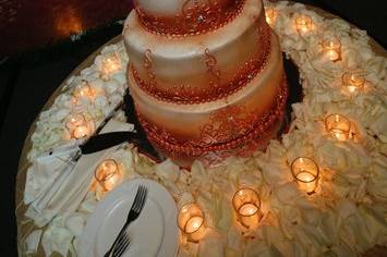 Heavy Layer of Petals with Votives to light up cake and Table