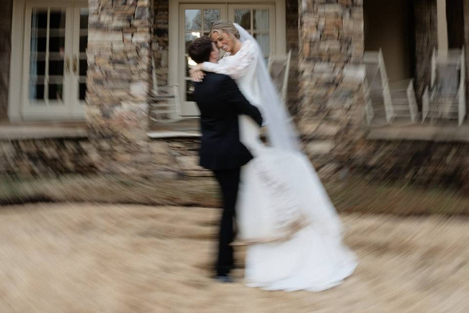 Bride and groom hug