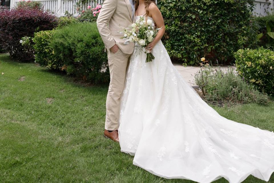 Bride and groom smile