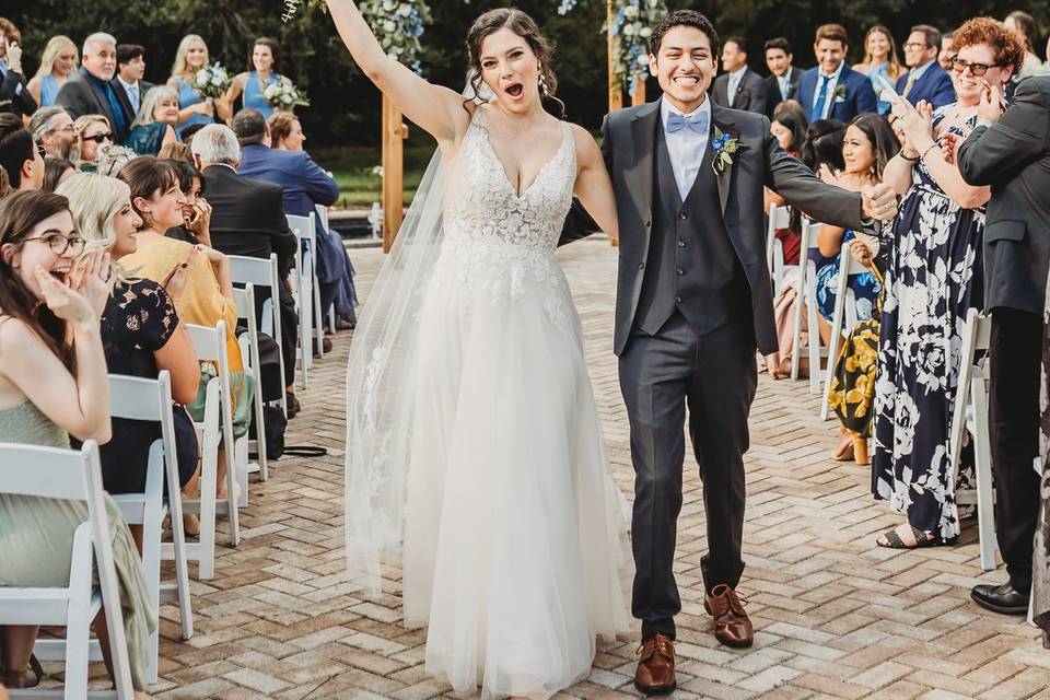 Bride and groom cheer