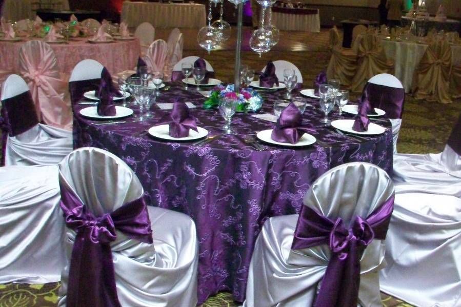 Purple and white table setup