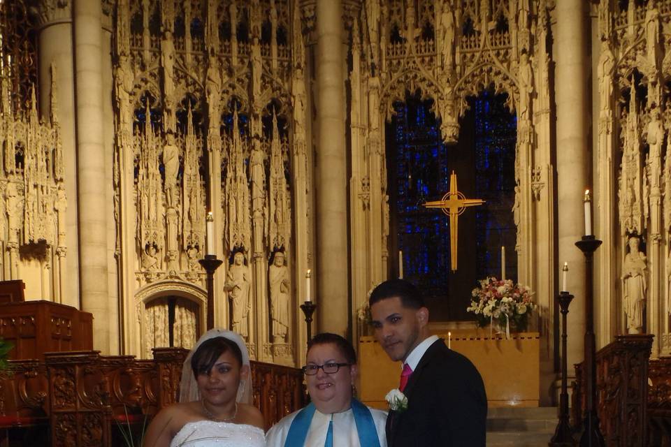 Elegant summer bilingual wedding co-officiated at the Nave The Riverside Church where the heartwarming story of how they met was shared at the beginning of the ceremony. Rituals: Arras and Unity Candle Ceremony. Brides bouquet arrangement was in beautiful brooches.