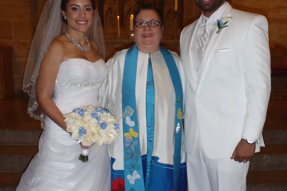 Elegant spring wedding in the Meditation Chapel at The Riverside Church. Readings: Entreat me Not from Book of Ruth and Corinthians.  Rituals: Unity Candle ceremony and Hand Fasting Ceremony.