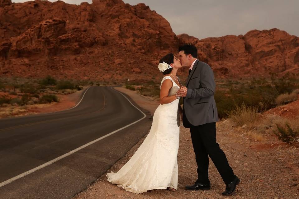 Couple kissing in desert