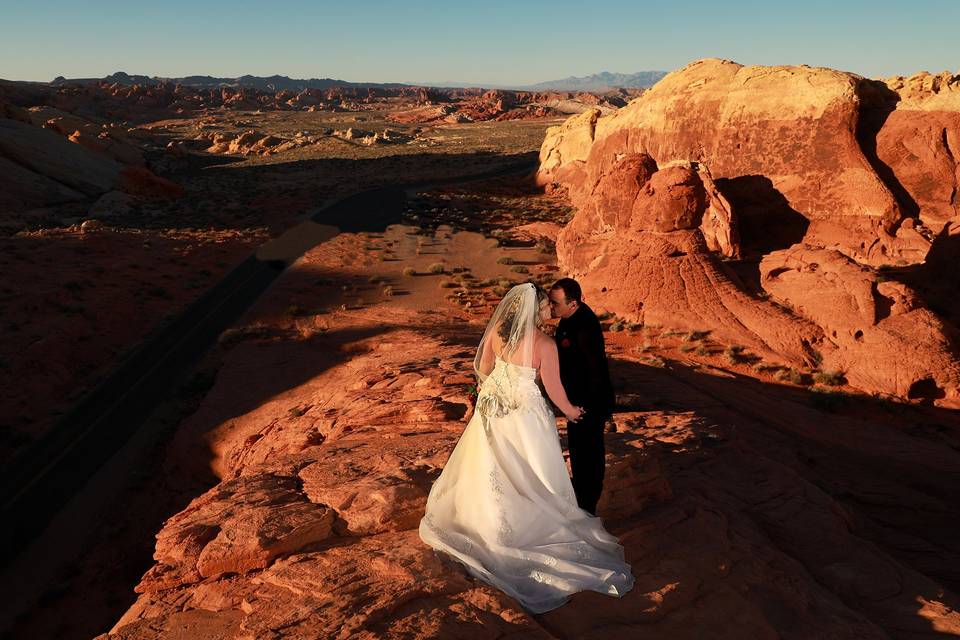 Couple kissing in desert