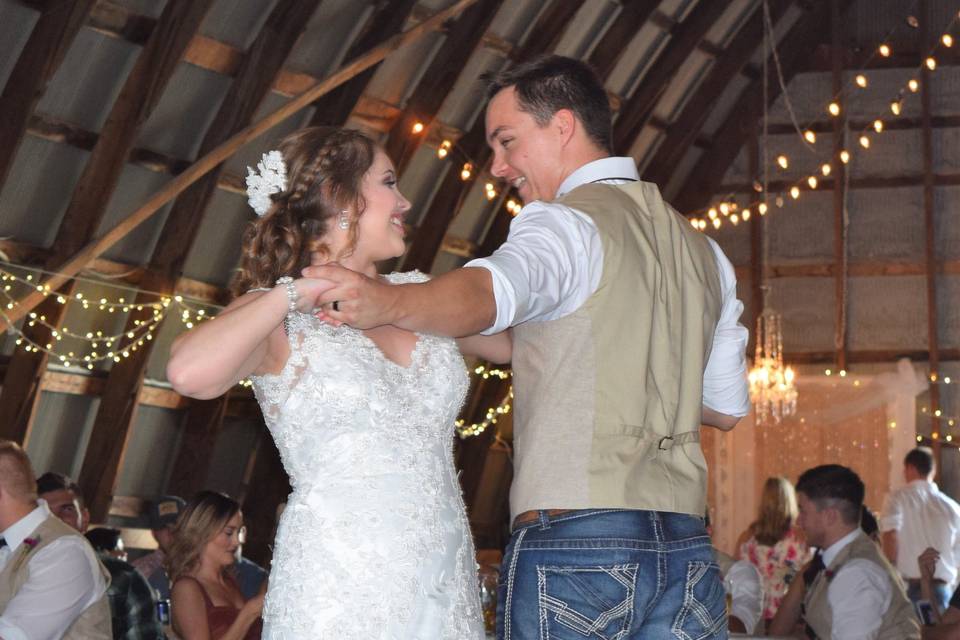 The bride and groom dancing