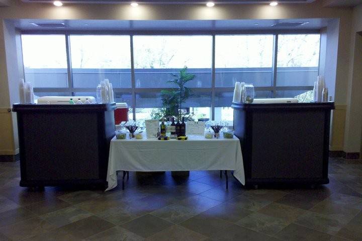 Grand Haven Community Center is a wonderful venue for your wedding ceremony and reception. You can get married in the park across the street or inside. This picture is of a bar setup on the first floor, allowing easy traffic flow.
