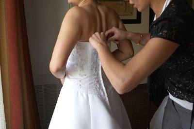 Wearing the wedding gown