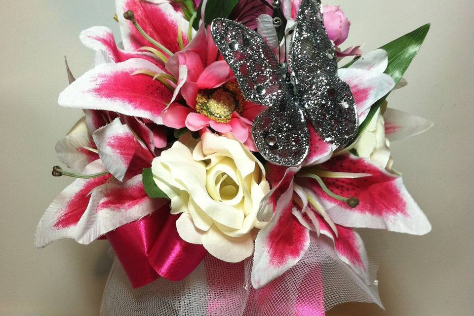 This is a Bridesmaid Bouquet for a bride who had pre-purchased flowers and we added some items to bring it all together!