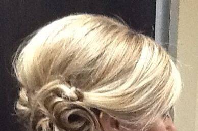 Swept to the right side updo.